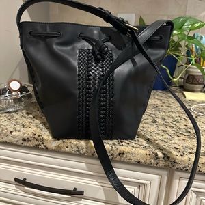SAK drawstring black leather handbag